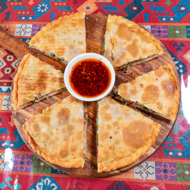 M5.	羊肉馅饼 (羊肉或南瓜) Uyghur Goshnaan (Lamb).