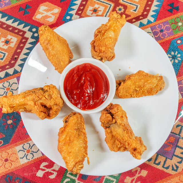 Fried or Spicy Chicken Wings.